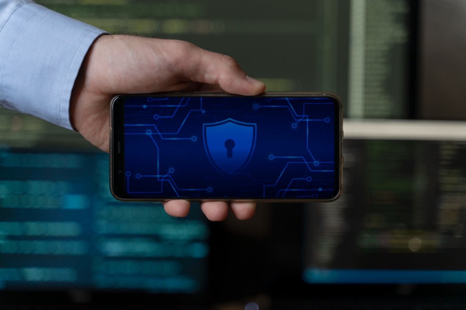 A man holding a smartphone.