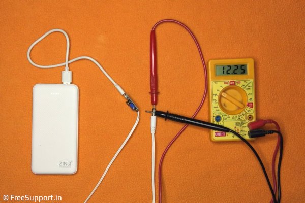 how to Adjust voltage while monitoring using a multimeter