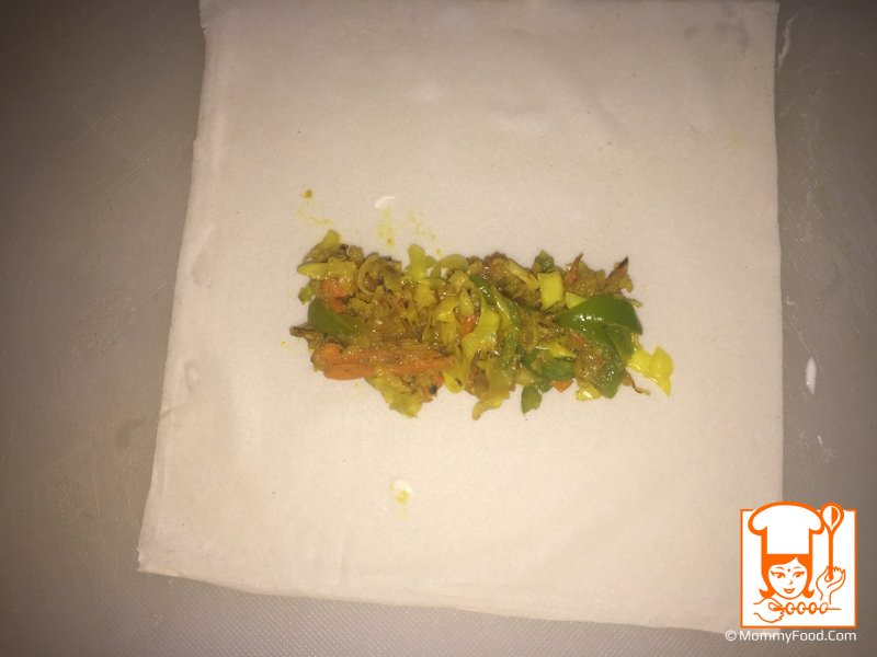 Vegetable filling on spring roll sheet