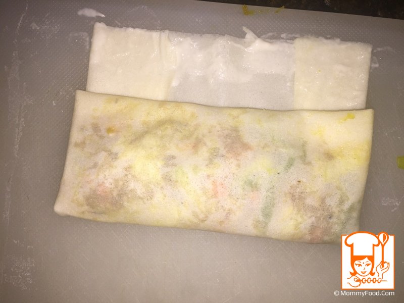 Sealing the spring roll with maida paste