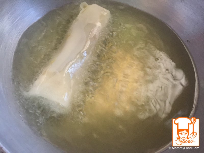 Frying the spring rolls in oil