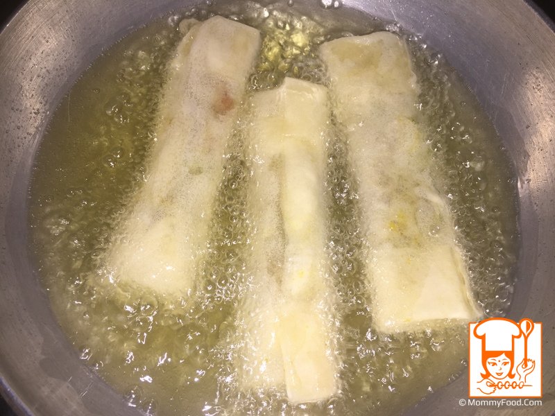 Spring rolls turning golden brown