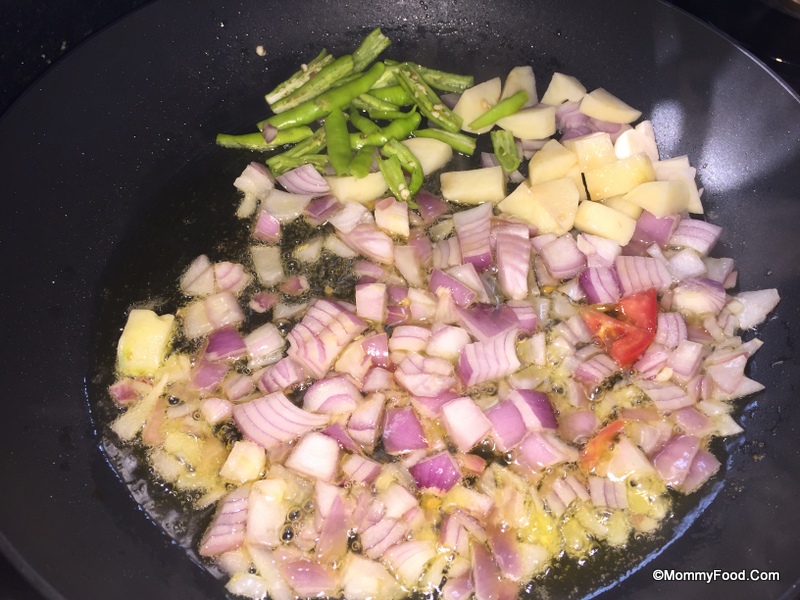 Frying Onions, Green Chillies, and Potato