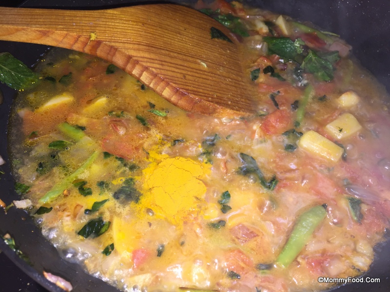 Cooking with water and turmeric powder