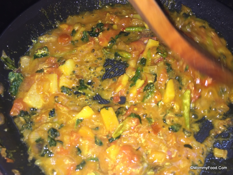 Adding soaked Mealmaker to the pan