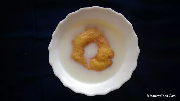 Dipping Vadas in Milk and Water
