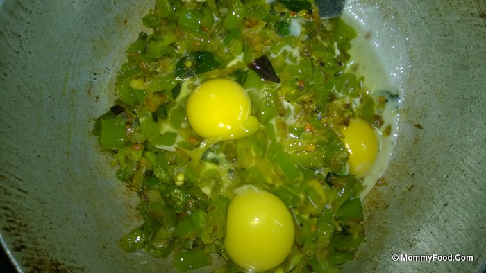 Adding eggs to the curry