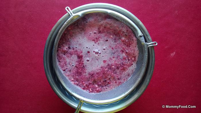 Filtering juice to remove seeds and pulp