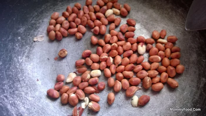 Fried ground nuts cooling