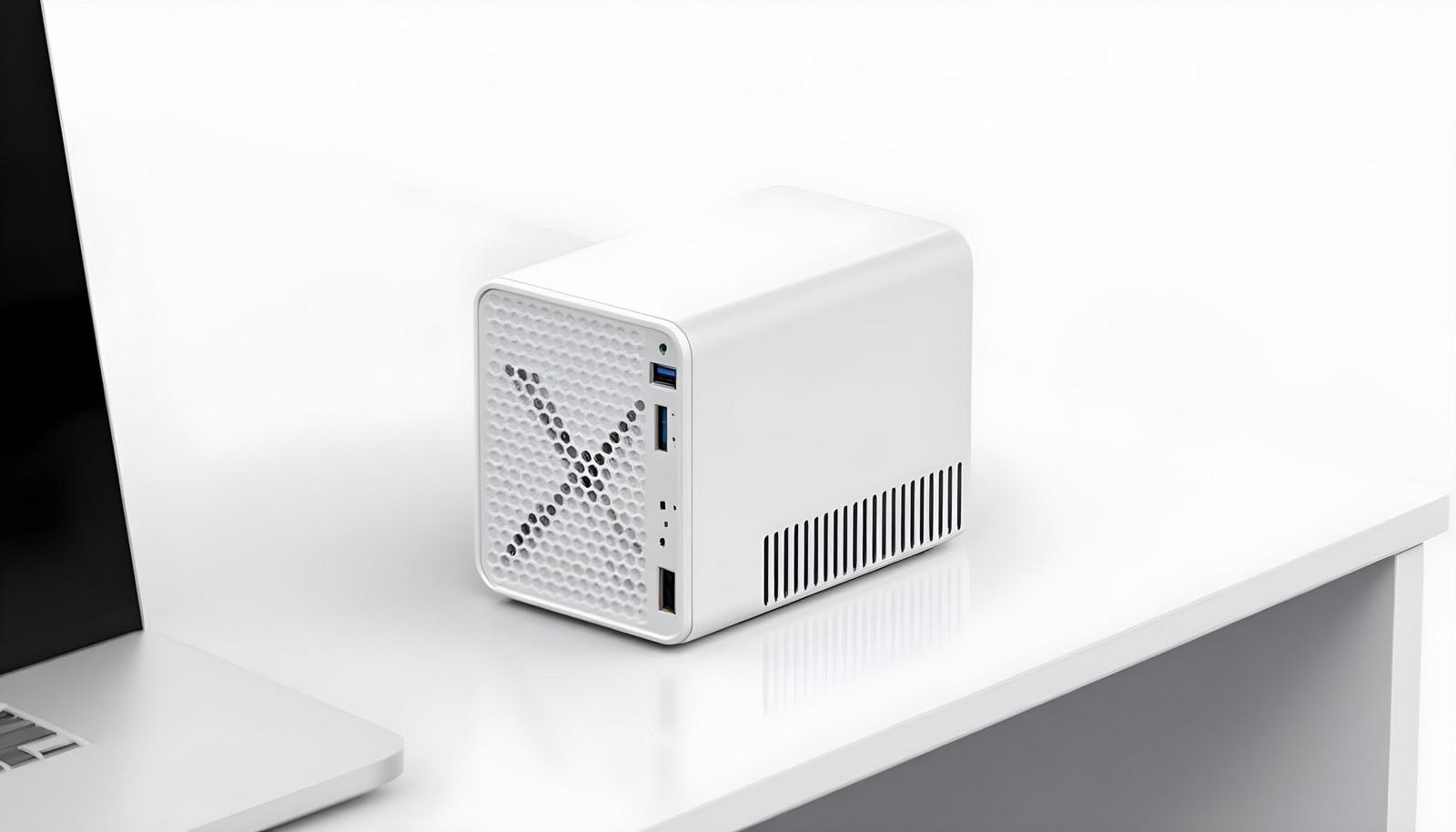 A sleek and compact Small Form Factor (SFF) case in a minimalist white design, positioned on a desk next to a laptop, showcasing efficient use of space and modern aesthetics.